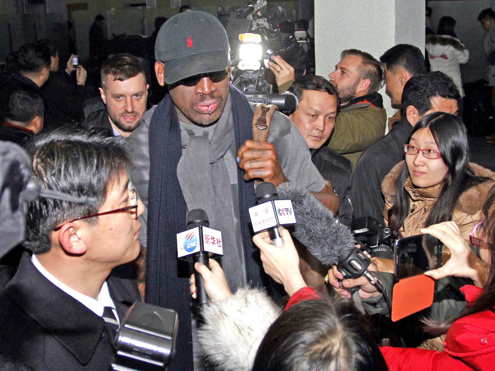 The former NBA star Dennis Rodman arrives in Pyongyang yesterday