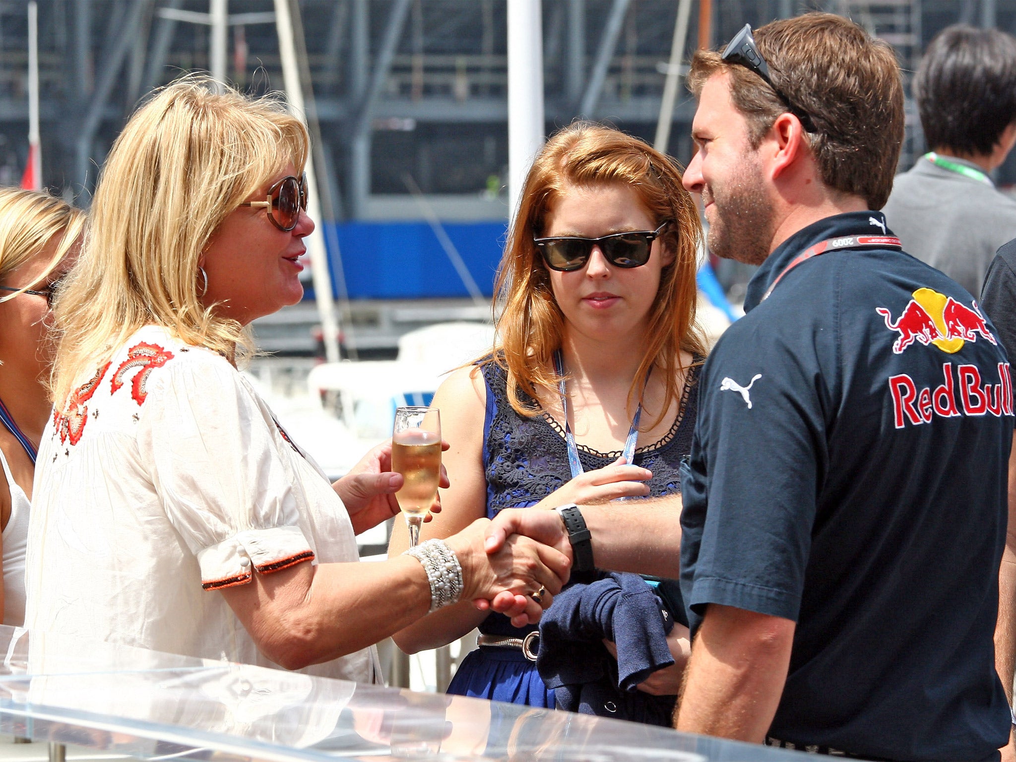 Princess Beatrice, centre, visits Red Bull’s F1 team