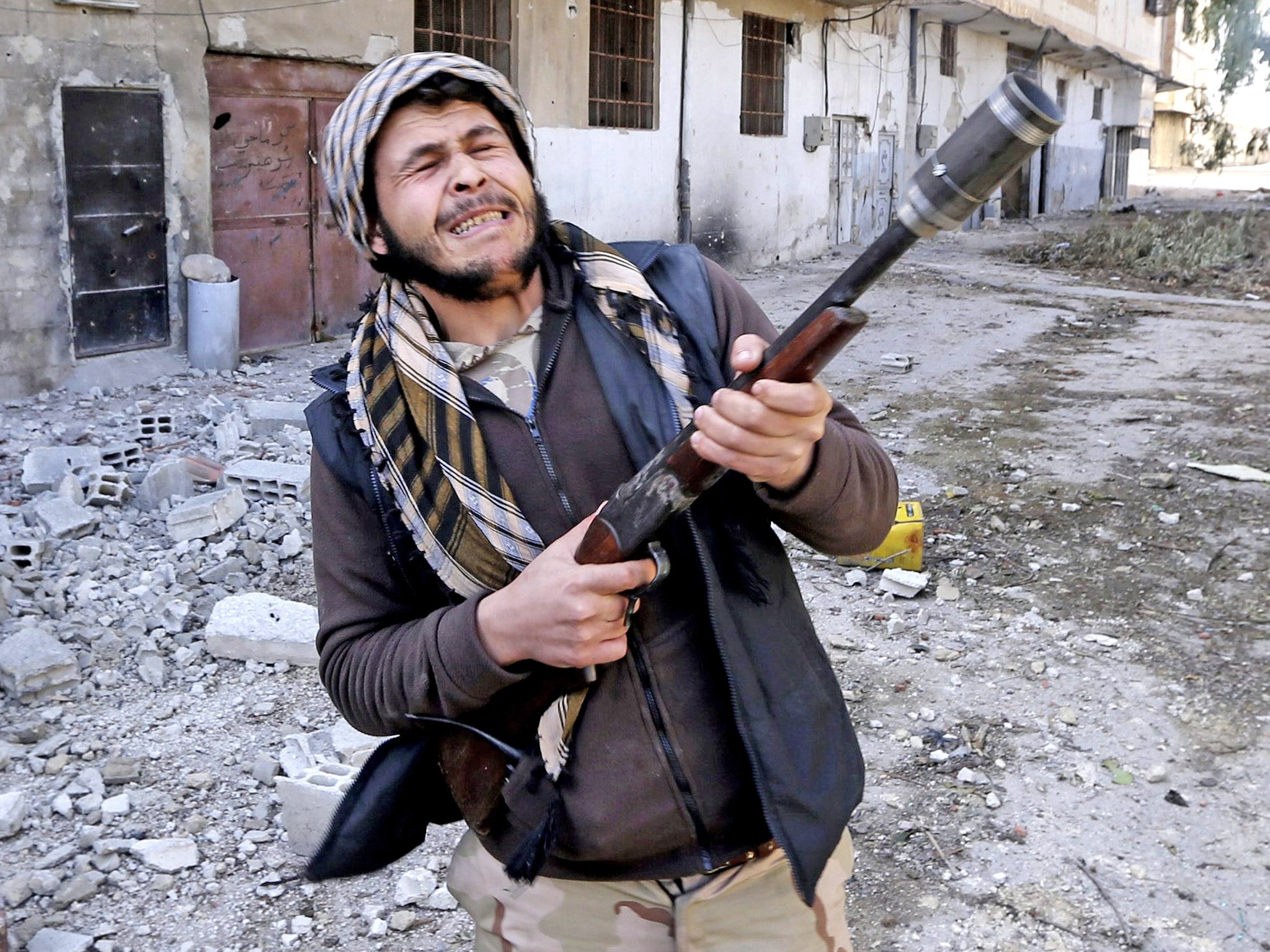 A Free Syrian Army rebel in a Damascus suburb