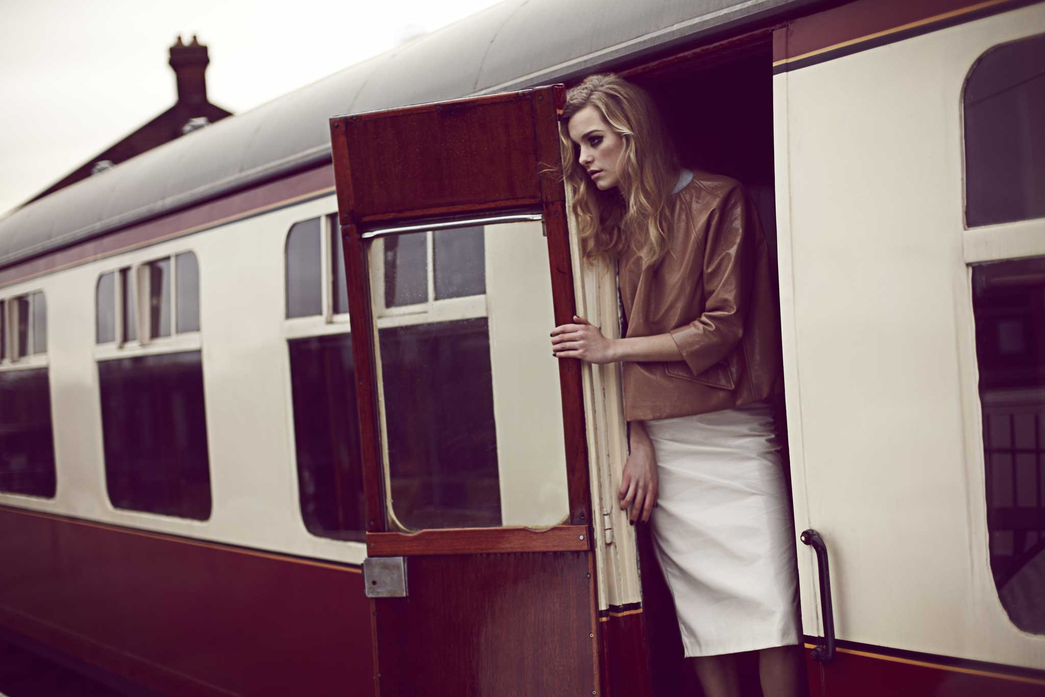 Collarless coated-fabric jacket, £635, and pencil skirt, £420, both by Miu Miu, 150 New Bond Street, London W1, 020-7409 0900, miumiu.com