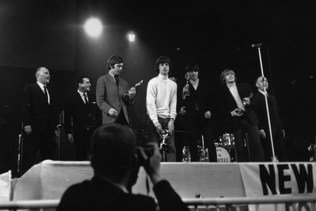 The Rolling Stones receiving awards at the NME Poll Winners Concert in 1965
