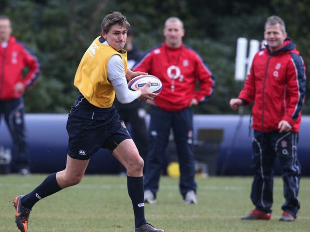 Stuart Lancaster (centre) watches Toby Flood during training at Pennyhill Park yesterday