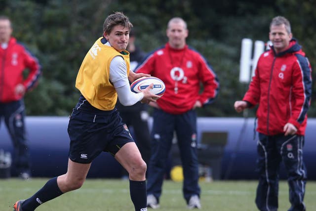 Stuart Lancaster (centre) watches Toby Flood during training at Pennyhill Park yesterday