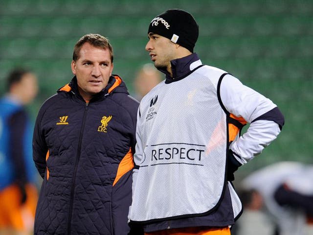 Luis Suarez (right) ‘has been phenomenal’, claims Rodgers