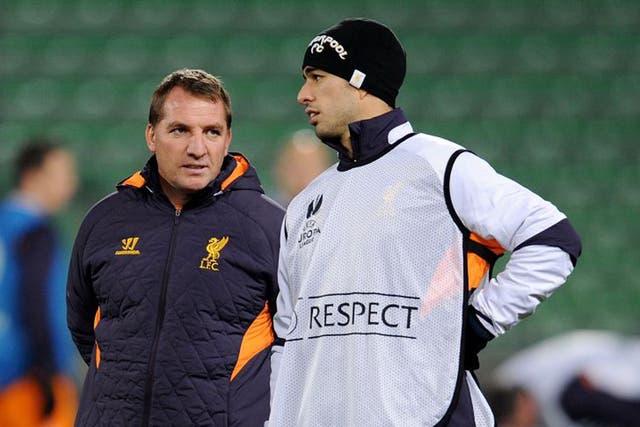 Luis Suarez (right) ‘has been phenomenal’, claims Rodgers