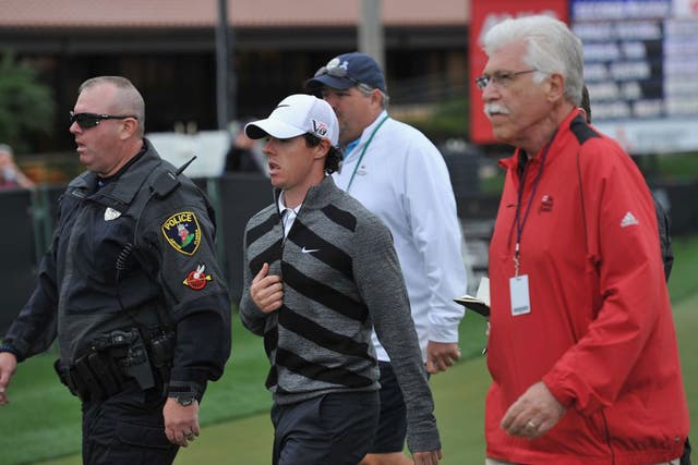 World No 1 Rory McIlroy stunned spectators here at the Honda Classic yesterday when, close to tears, he quit the tournament 