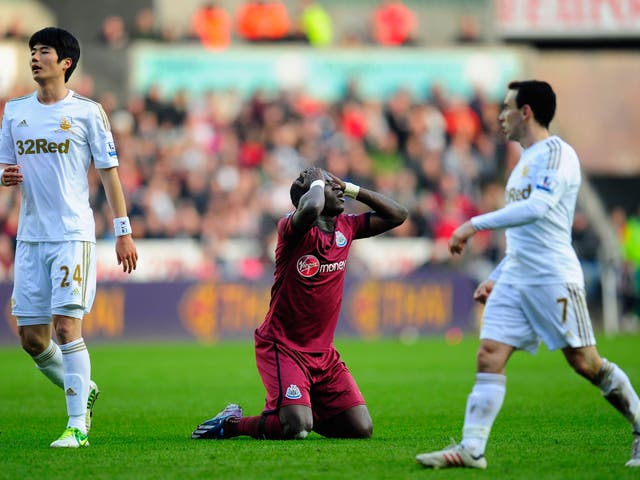 Newcastle player Moussa Sissoko reacts after a near mis
