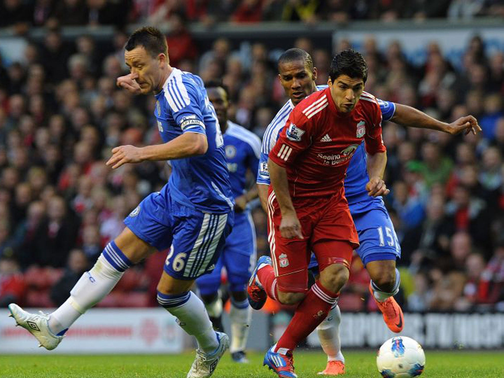 Unacceptable: John Terry (left) and Luis Suarez still have cases to answer