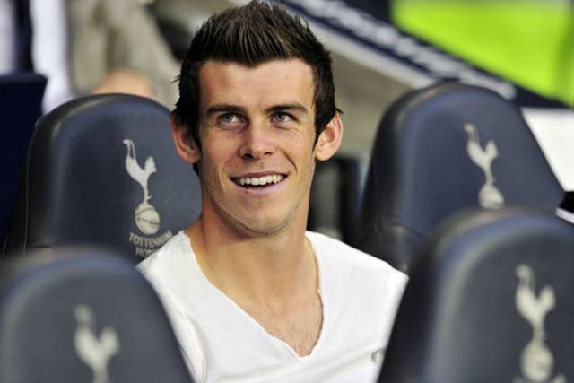 In the box seat: Life couldn’t be better for Gareth Bale but his family will make sure his feet stay on the ground