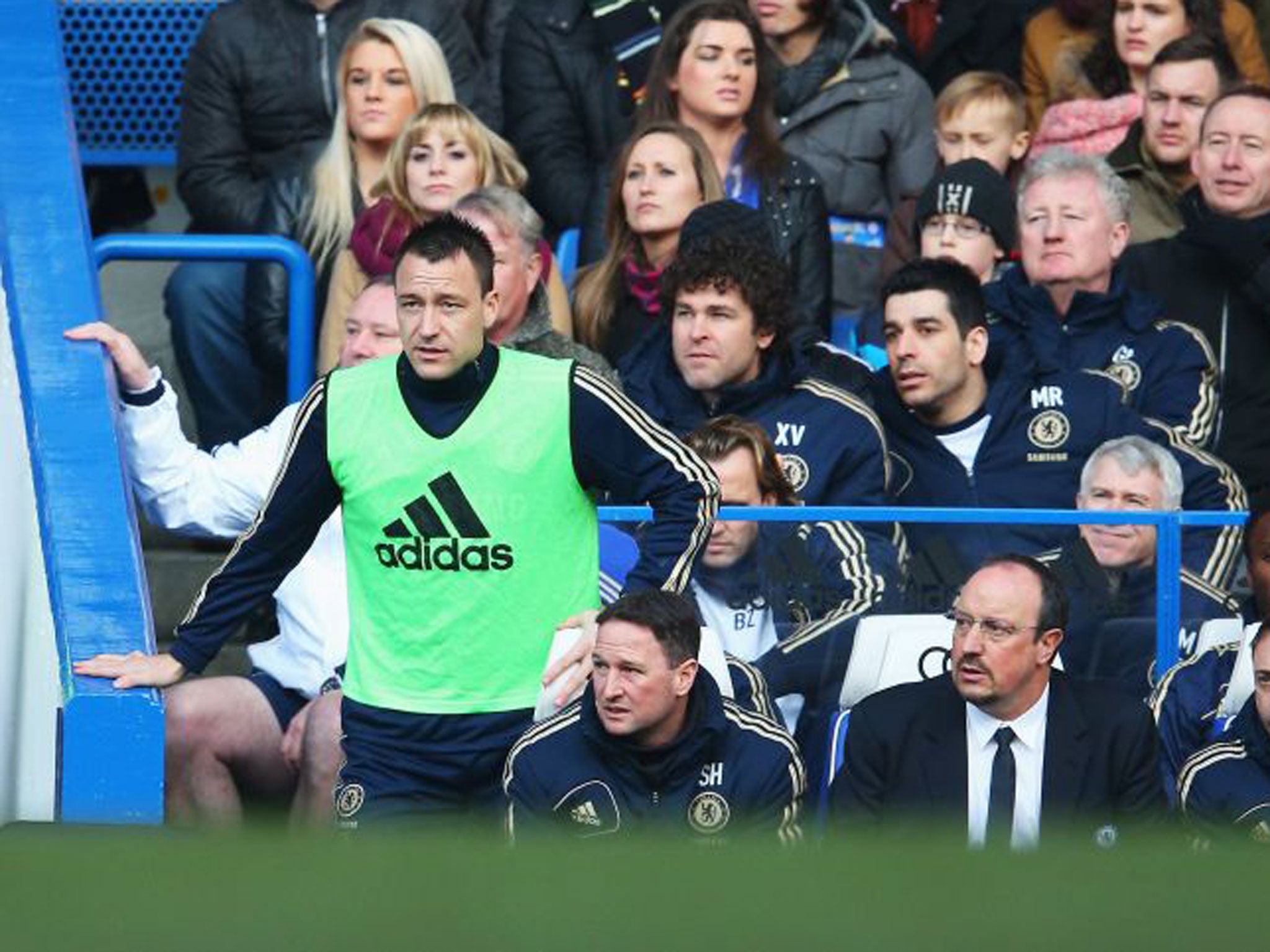 John Terry watches the game from the Stamford Bridge bench on Saturday
