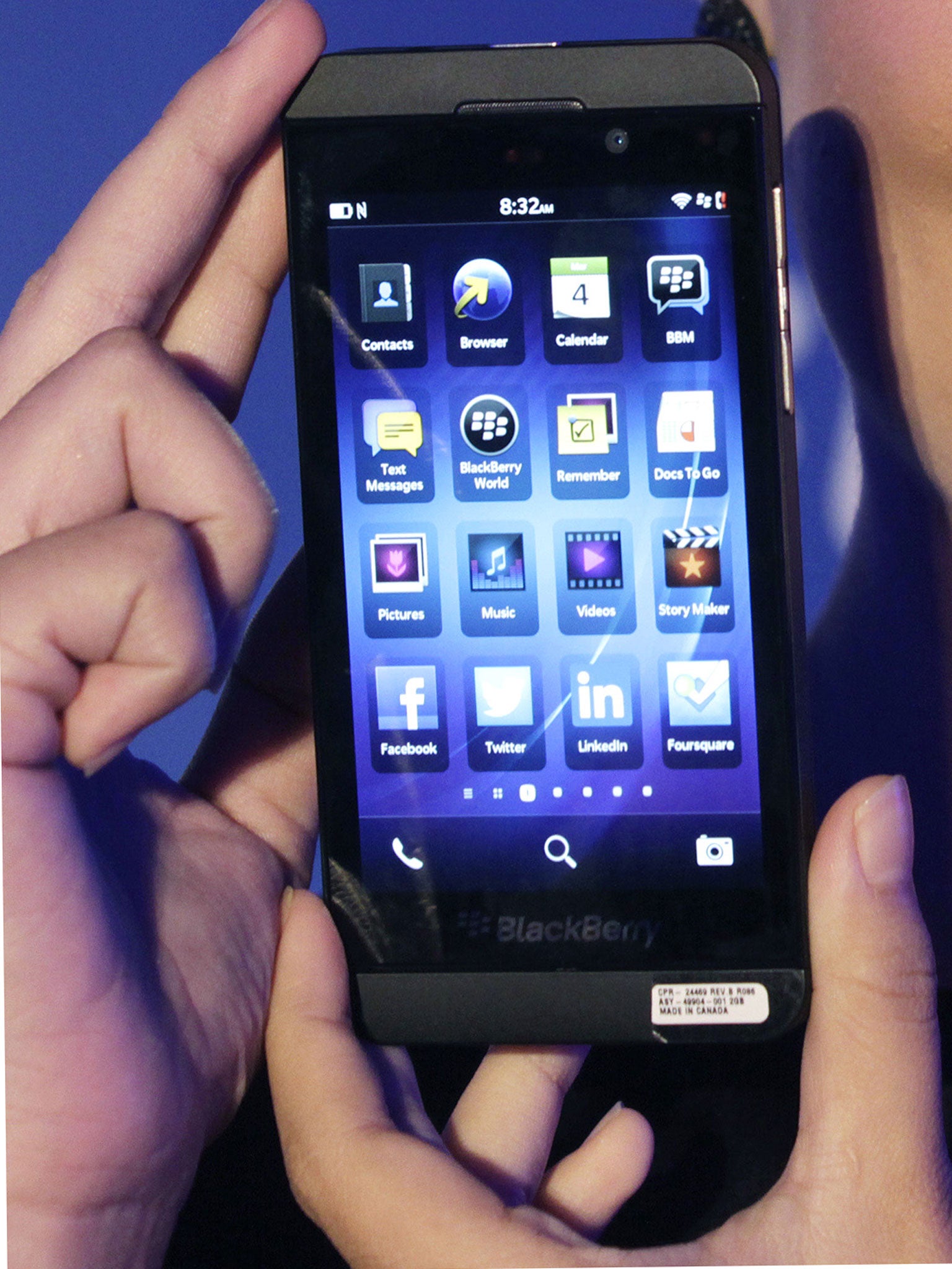 A model holds a BlackBerry Z10 during its launch in Jakarta March 4, 2013.