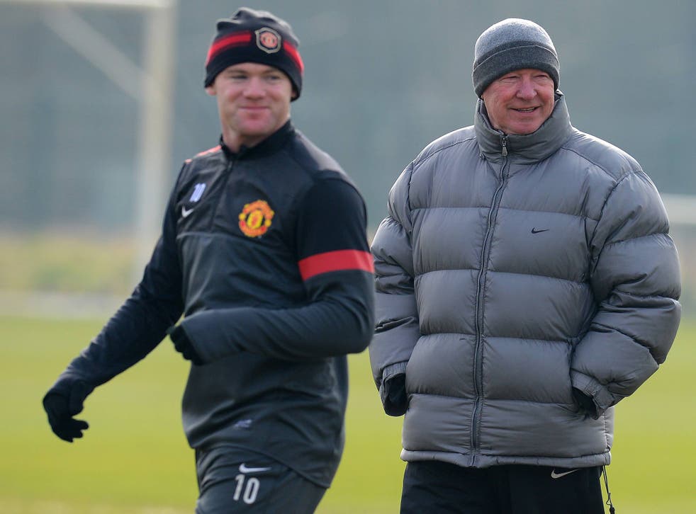 Wayne Rooney and Alex Ferguson in training