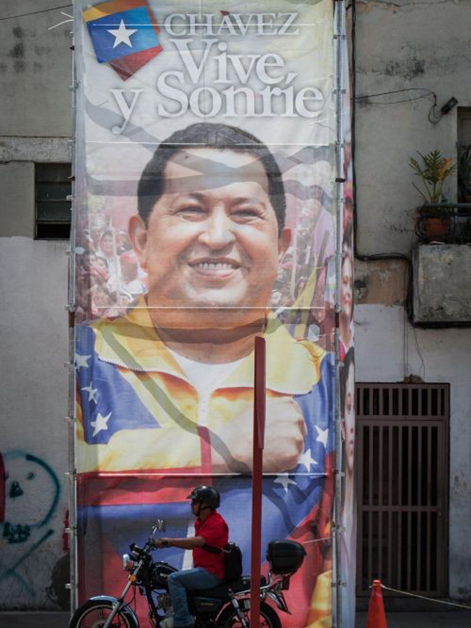 A billboard outside the military hospital in Caracas where Chavez is being treated