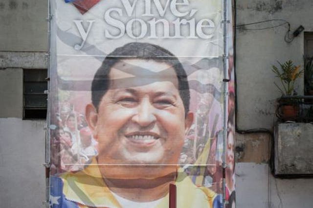 A billboard outside the military hospital in Caracas where Chavez is being treated