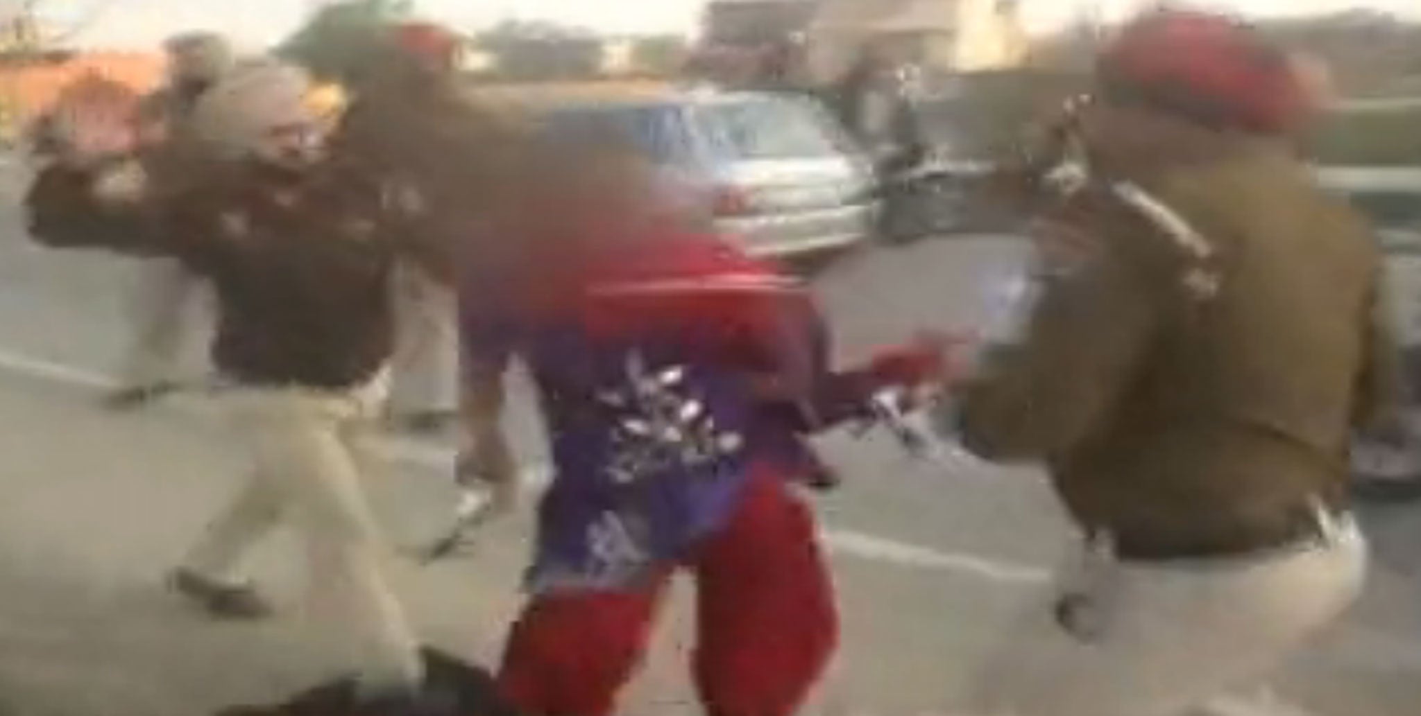 Officers appear to have used large sticks and their fists to brutally assault the 23-year-old