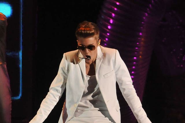 Justin Bieber performs live on stage at 02 Arena on March 4, 2013 in London, England.
