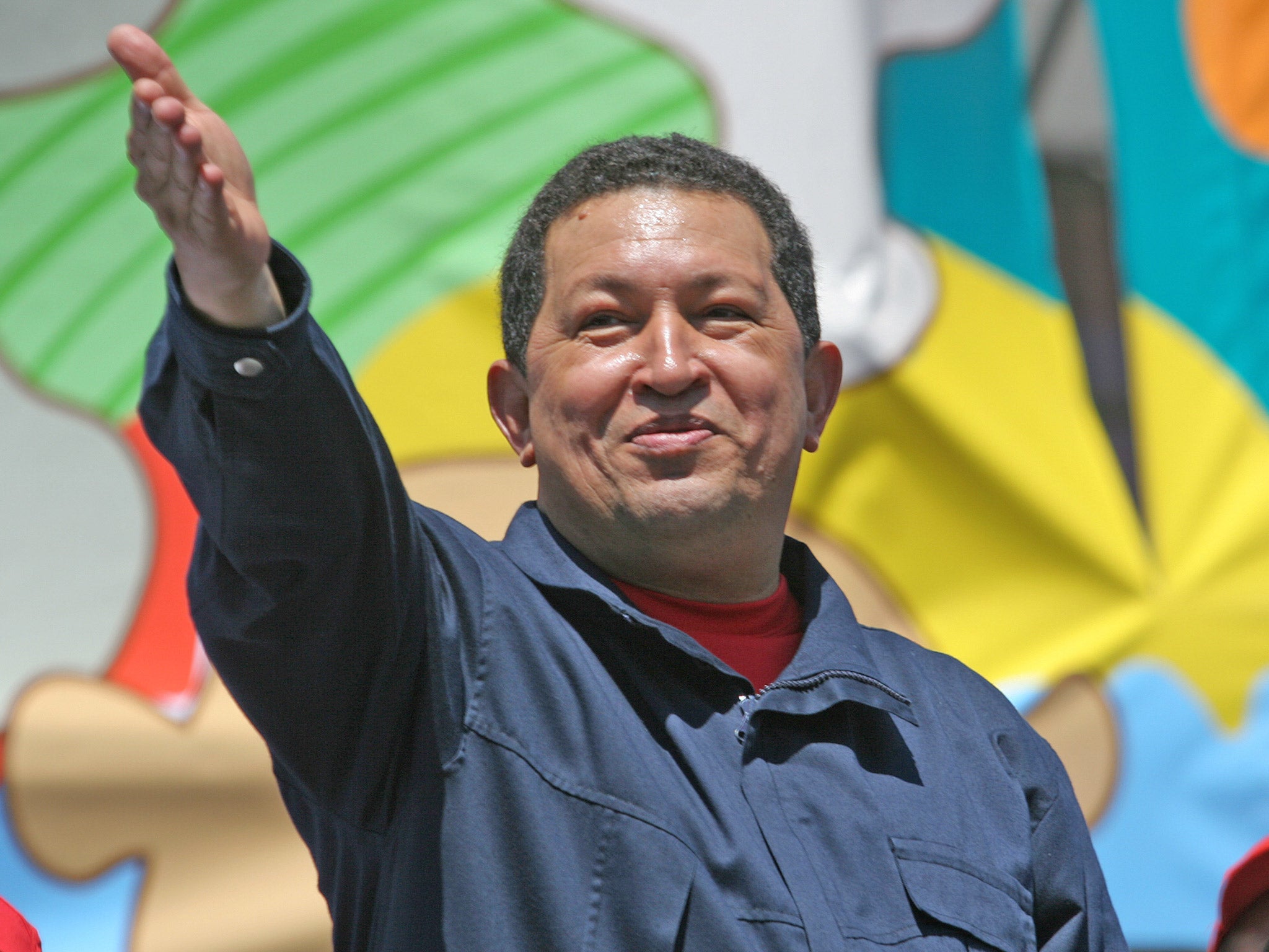 Chavez salutes the crowd at a summit in 2007