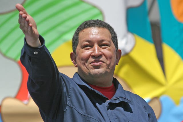 Chavez salutes the crowd at a summit in 2007
