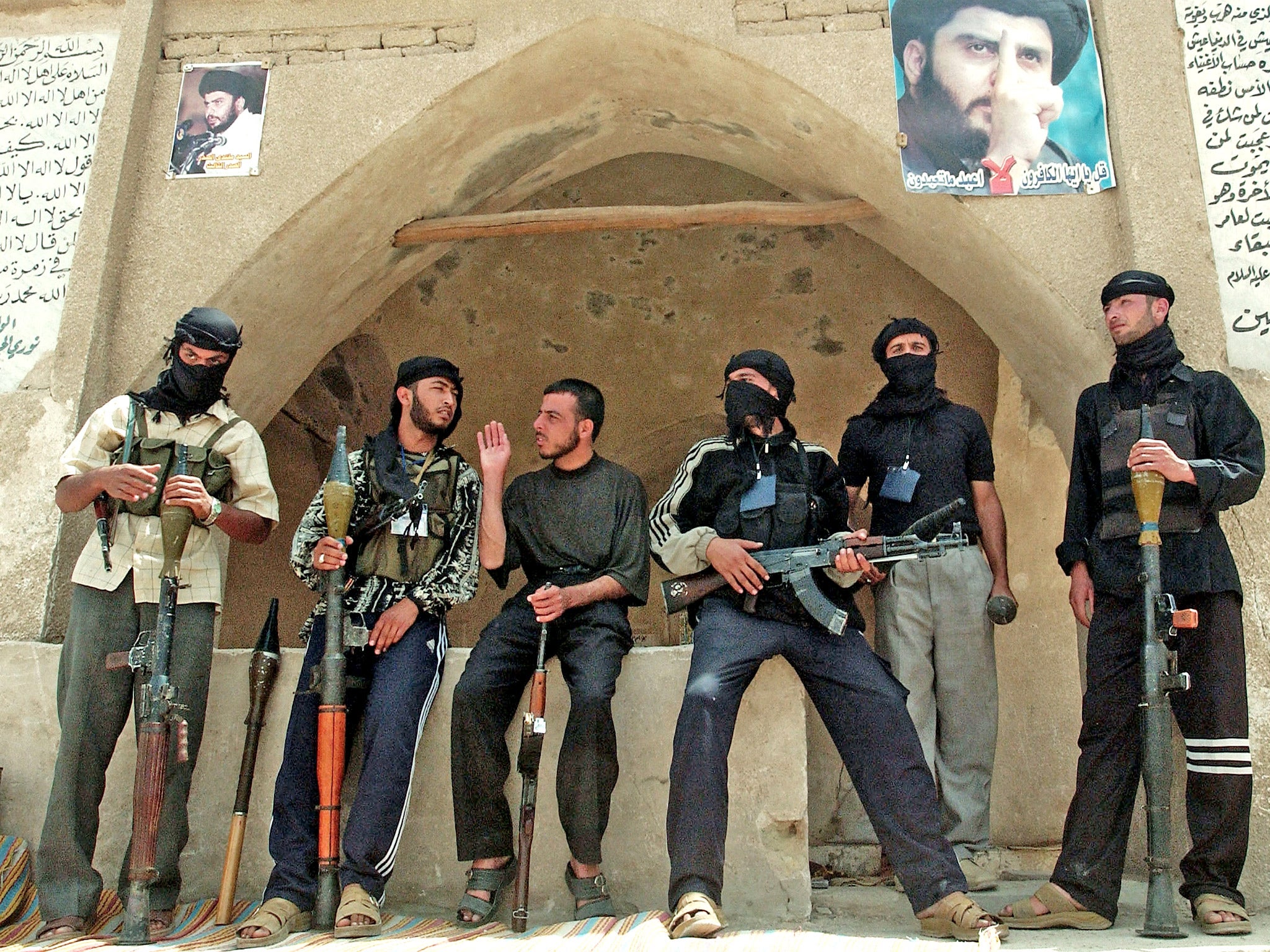 Members of the Mehdi Army outside the cemetery in Najaf in 2004
