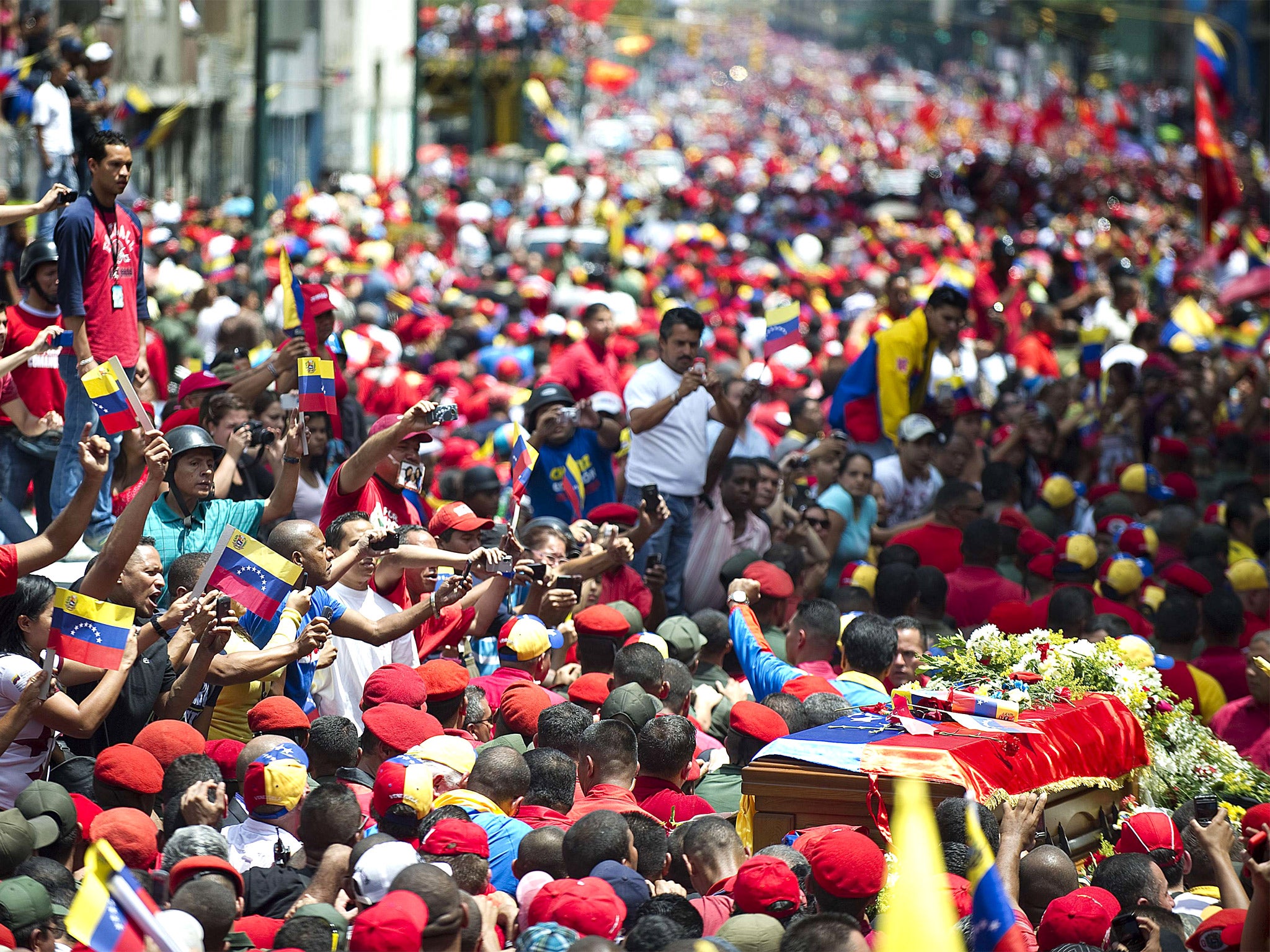 Chavez’s coffin was paraded through the streets of Caracas