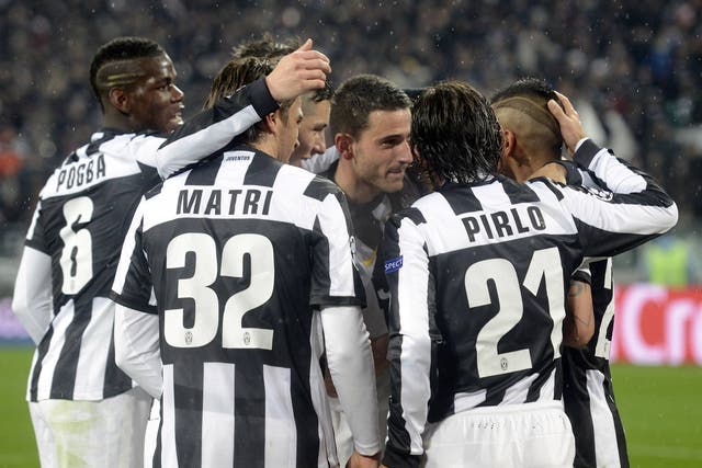 Andrea Pirlo and his Juventus team-mates celebrate during their victory over Celtic in the Champions League