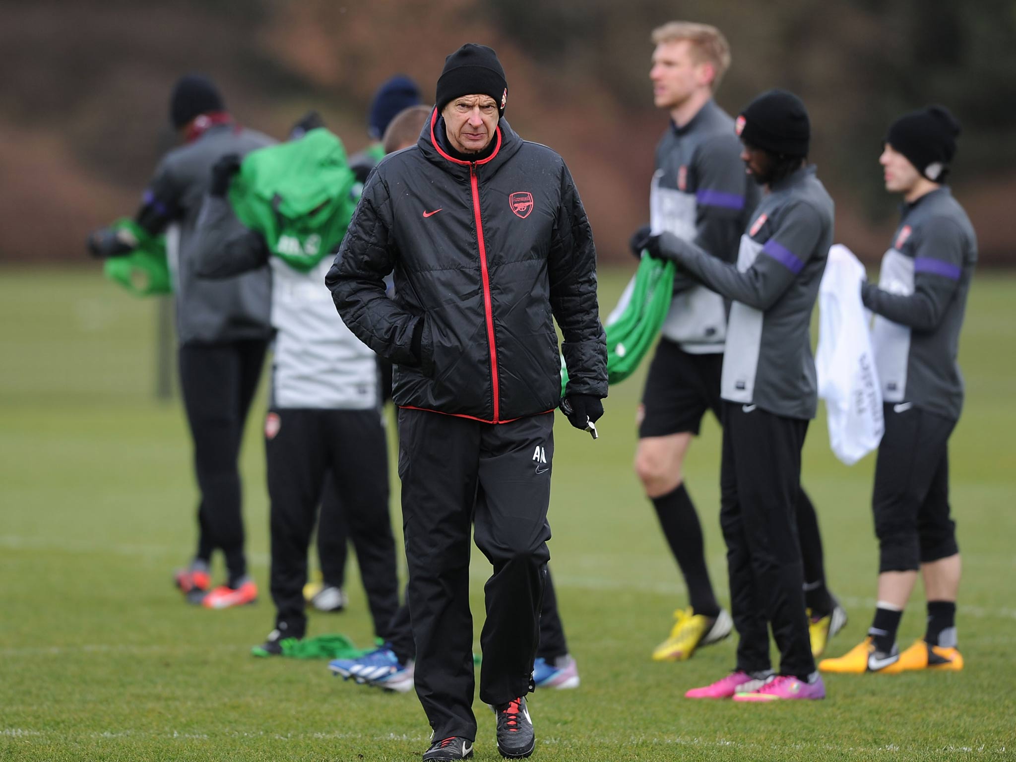 Arsene Wenger trains with his Arsenal players