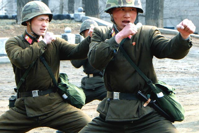 North Korean soldiers carry out combat training in a picture released yesterday by the North Korean Central News Agency