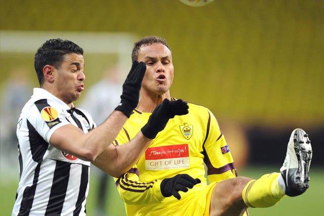 Anji's defender Ewerton vies with Newcastle's Hatem Ben Arfa