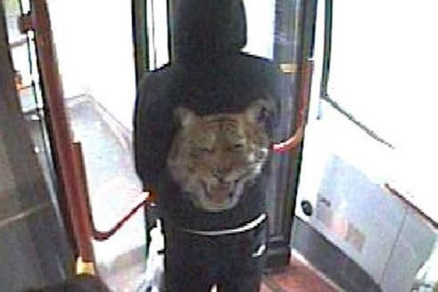 CCTV grab issued by West Midlands Police of a man wearing a distinctive tiger jacket on a bus as police have appealed to the people of Birmingham to let them know if they saw this man yesterday morning between 6 am and 1pm