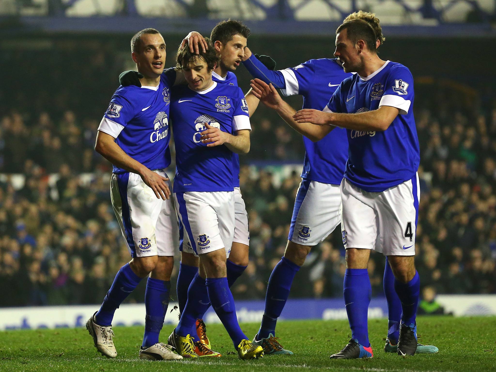 Leighton Baines is congratulated by his team-mates