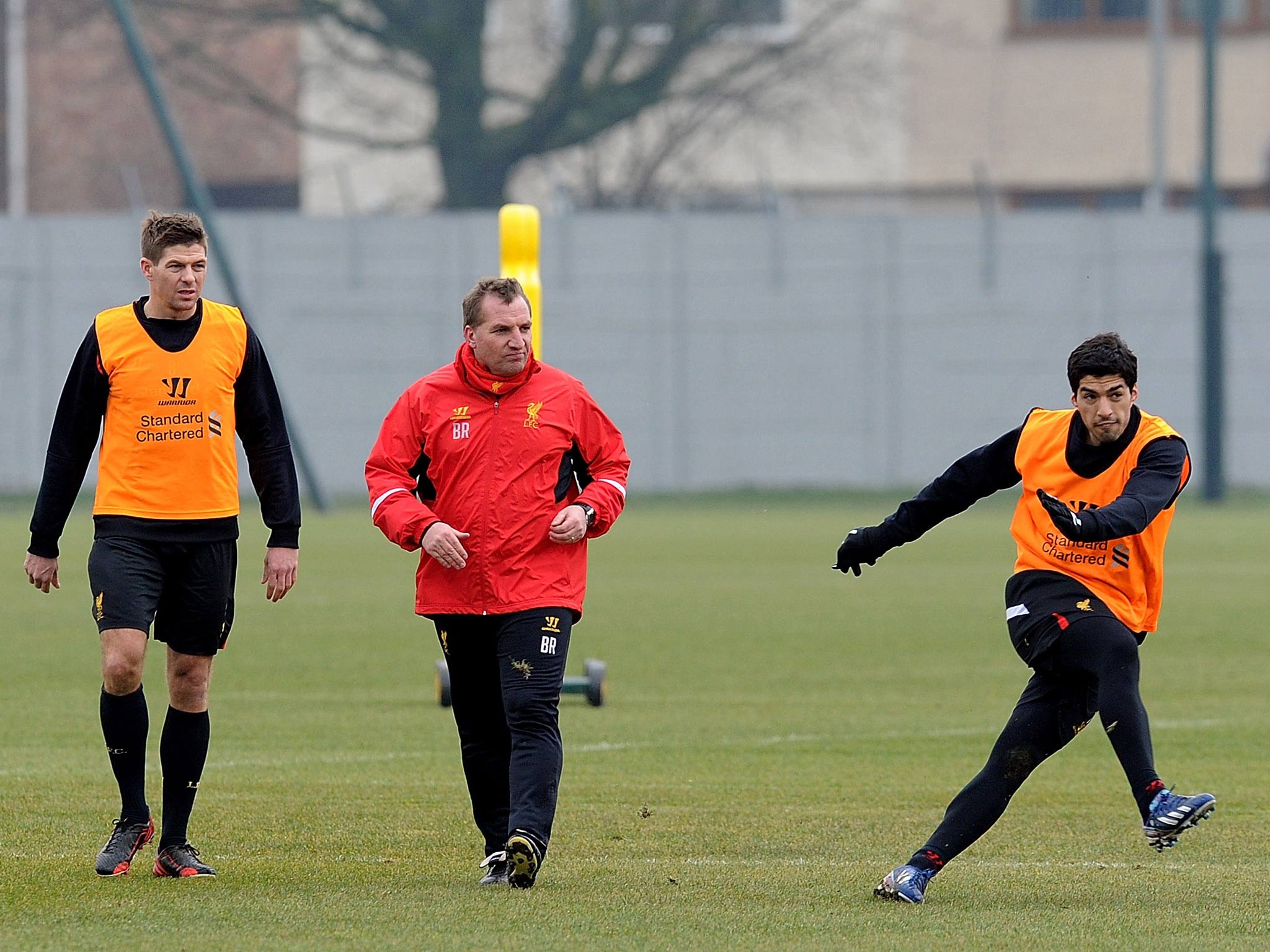 Steven Gerrard, Brendan Rodgers and Luis Suarez in training