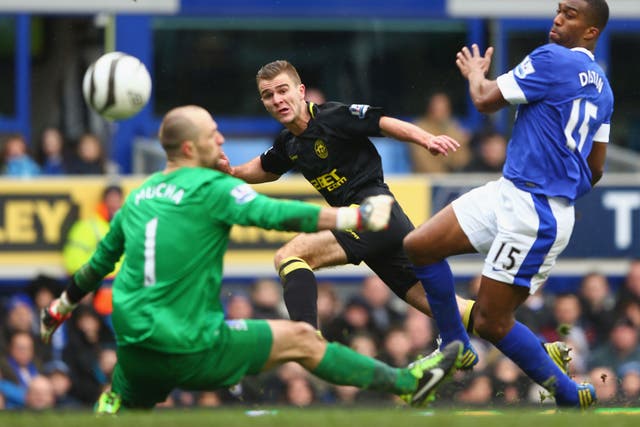 Callum McManaman (C) of Wigan Athletic scores his sides third goal during the demolition of Everton in the last round