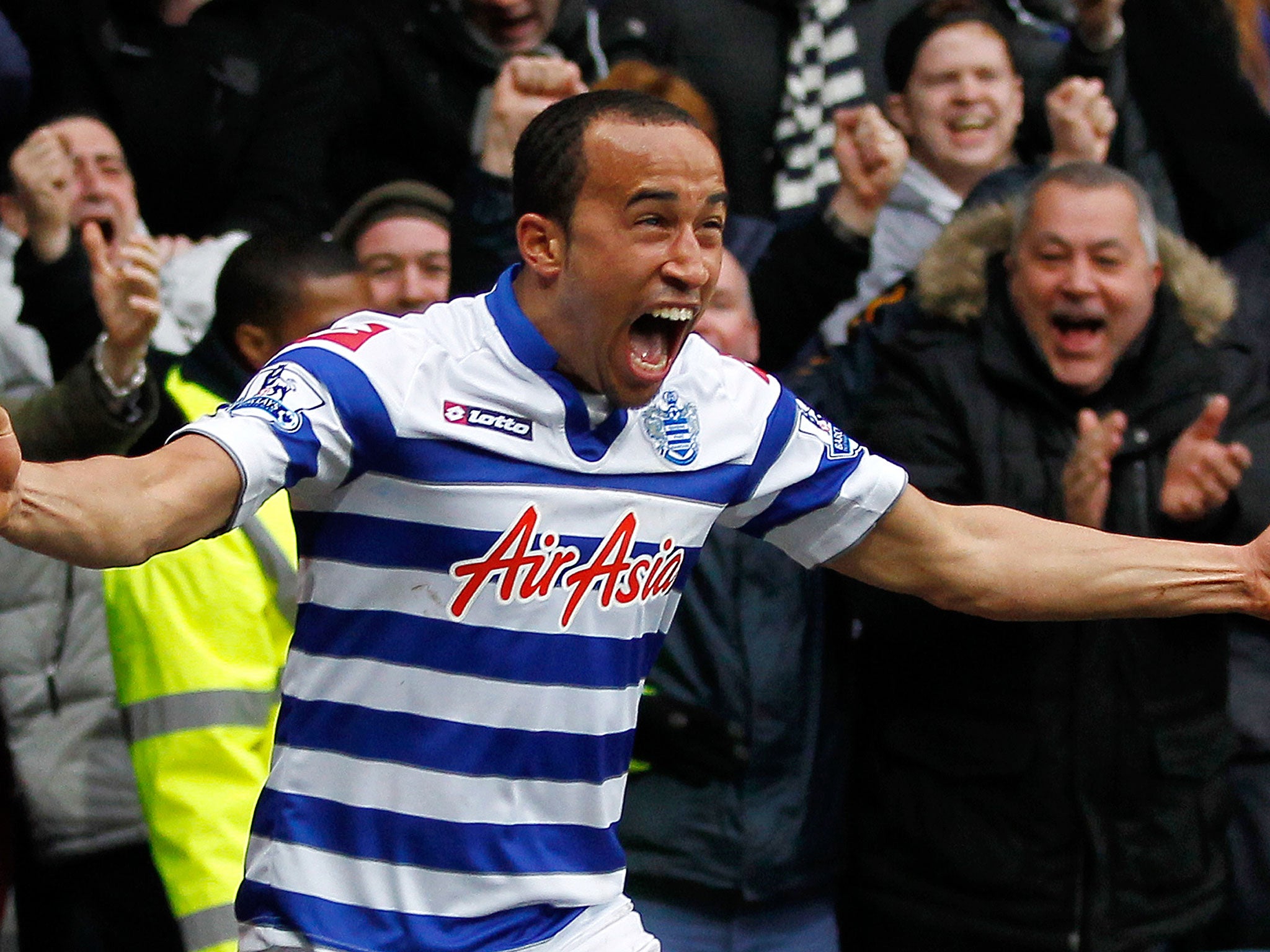 Queens Park Rangers English midfielder Andros Townsend celebrates scoring his team's second goal