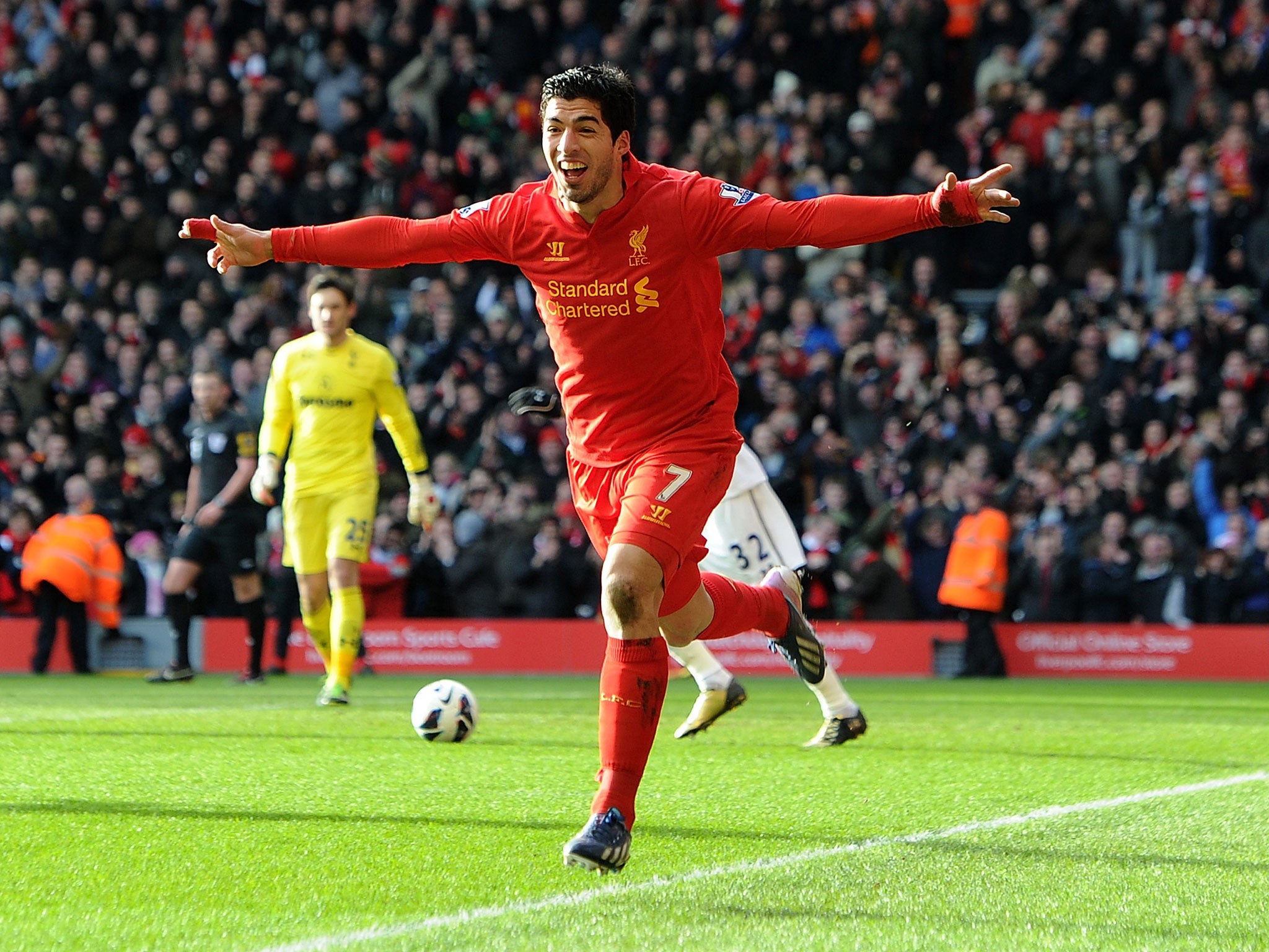 Luis Suarez of Liverpool celebrates his goal to make it 1-0
