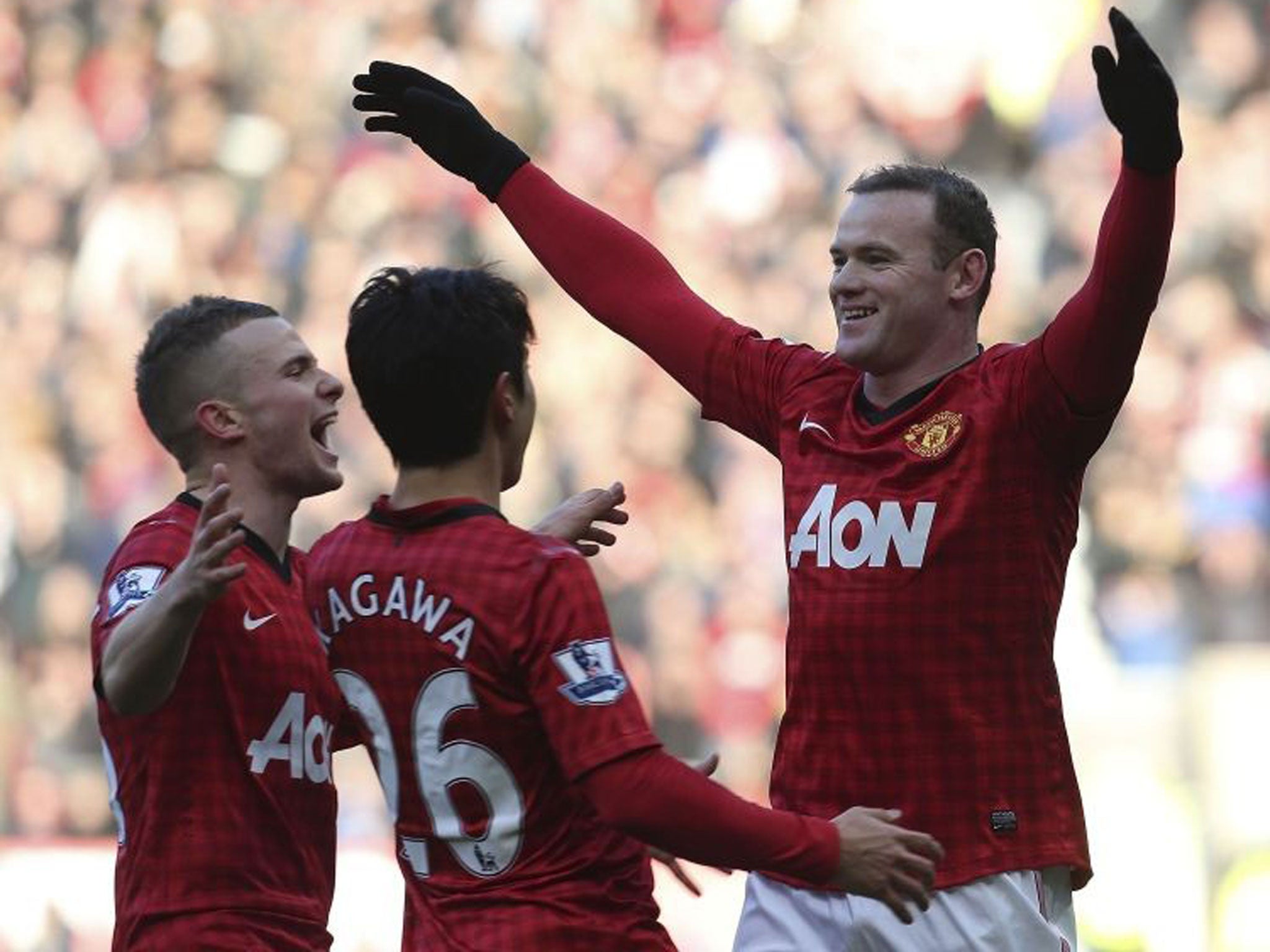 Wayne Rooney celebrates after scoring against Chelsea yesterday