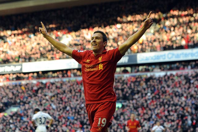 Stewart Downing of Liverpool celebrates after scoring against Spurs