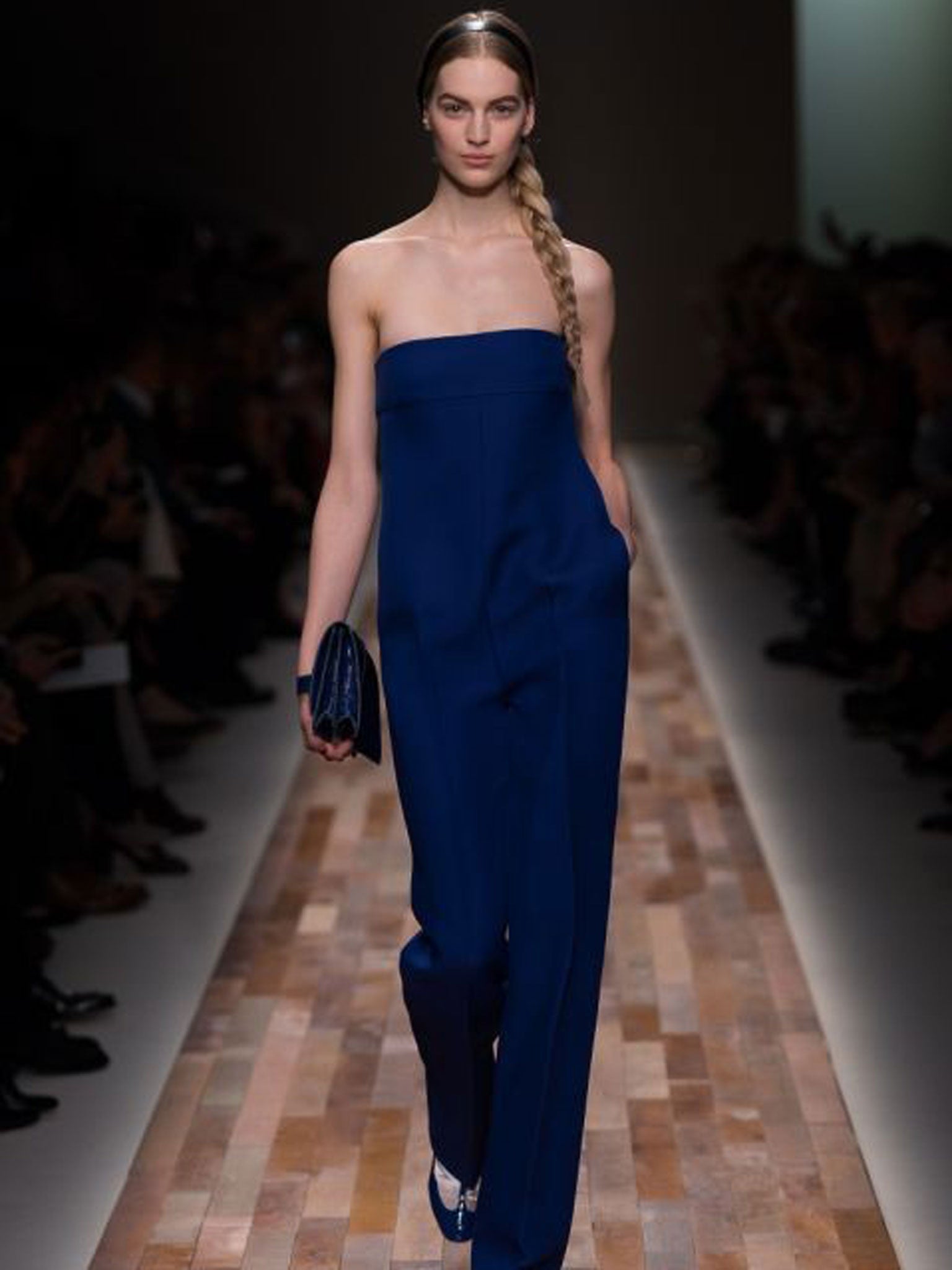 <b>All in one</b><br>
The royal blue silk jumpsuit looked as elegant as the intricate tulle dresses on the Valentino catwalk – and strapless too – another trend to emerge from the runway last week. Comme des Garçons sleeves were overblown and at Kenzo cotton jumpsuits were printed. At Loewe, they were constructed from leather.