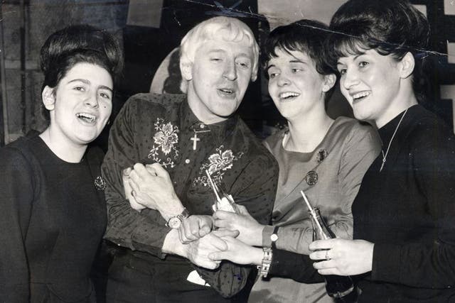 Jimmy Savile with Beatles fans in 1965Jimmy Savile with Beatles fans in 1965