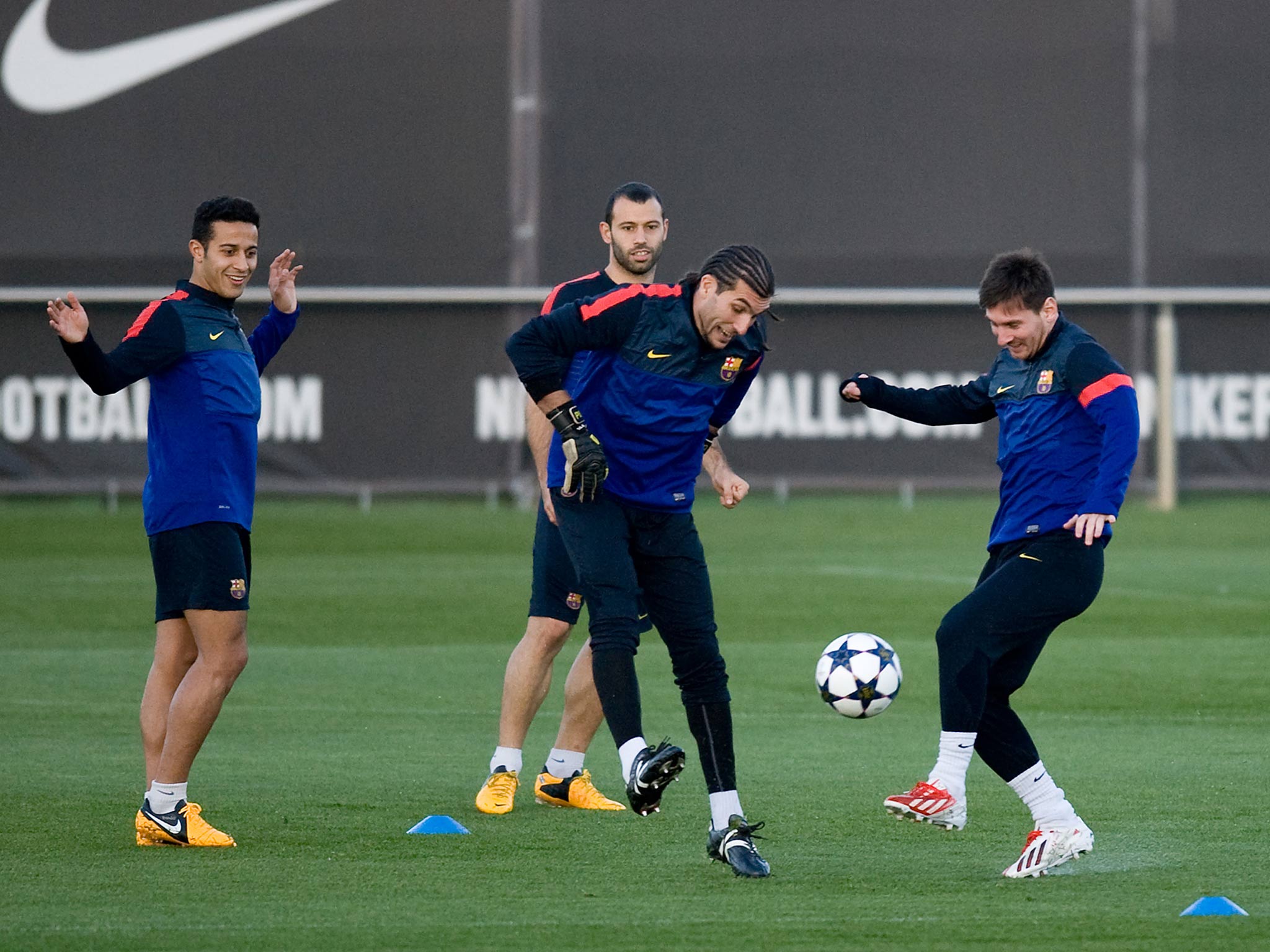 Lionel Messi trains with his Barcelona team-mates
