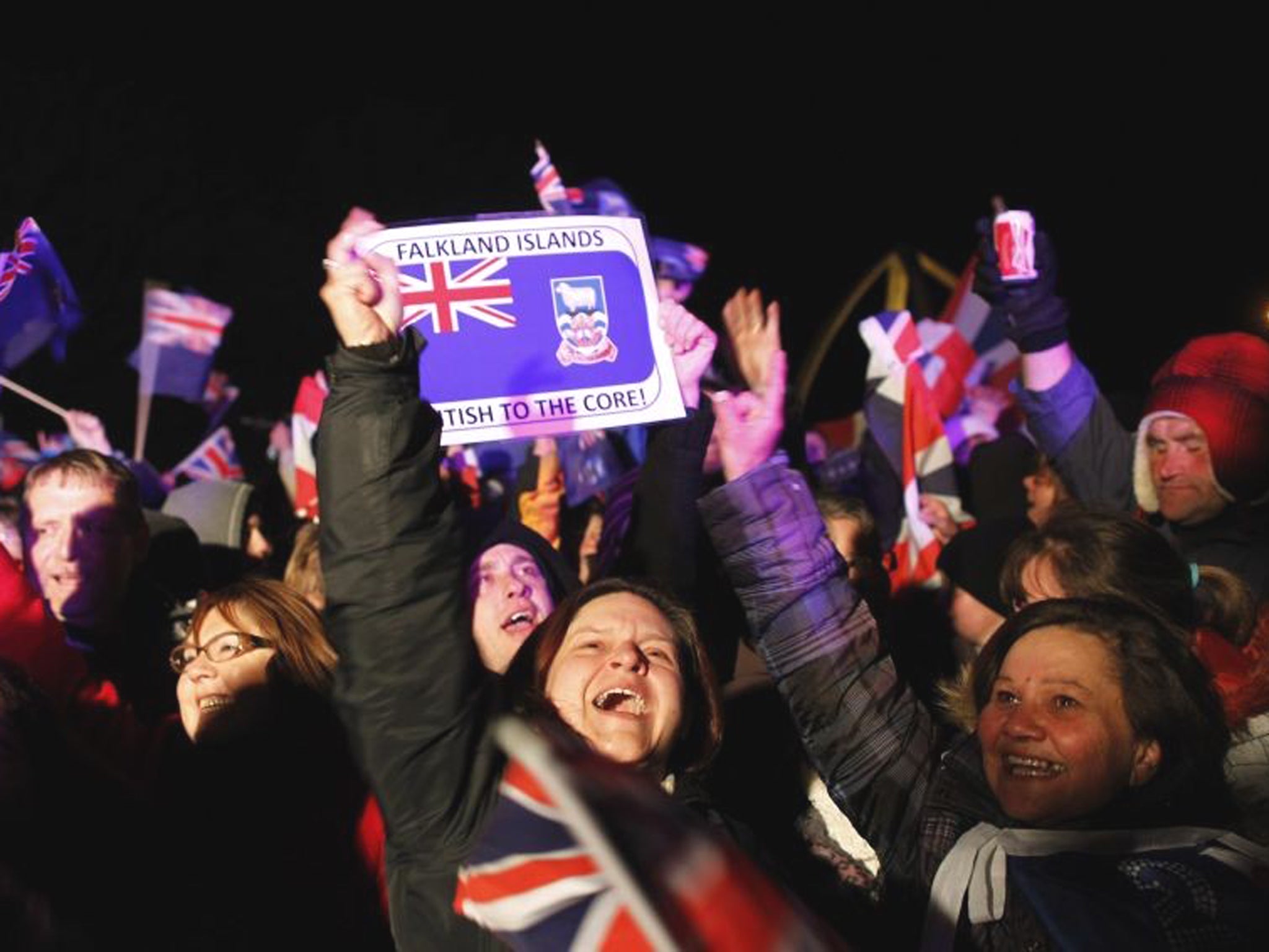 Falkland islanders react after hearing the results of the 2013 referendum affirming Britain's ownership