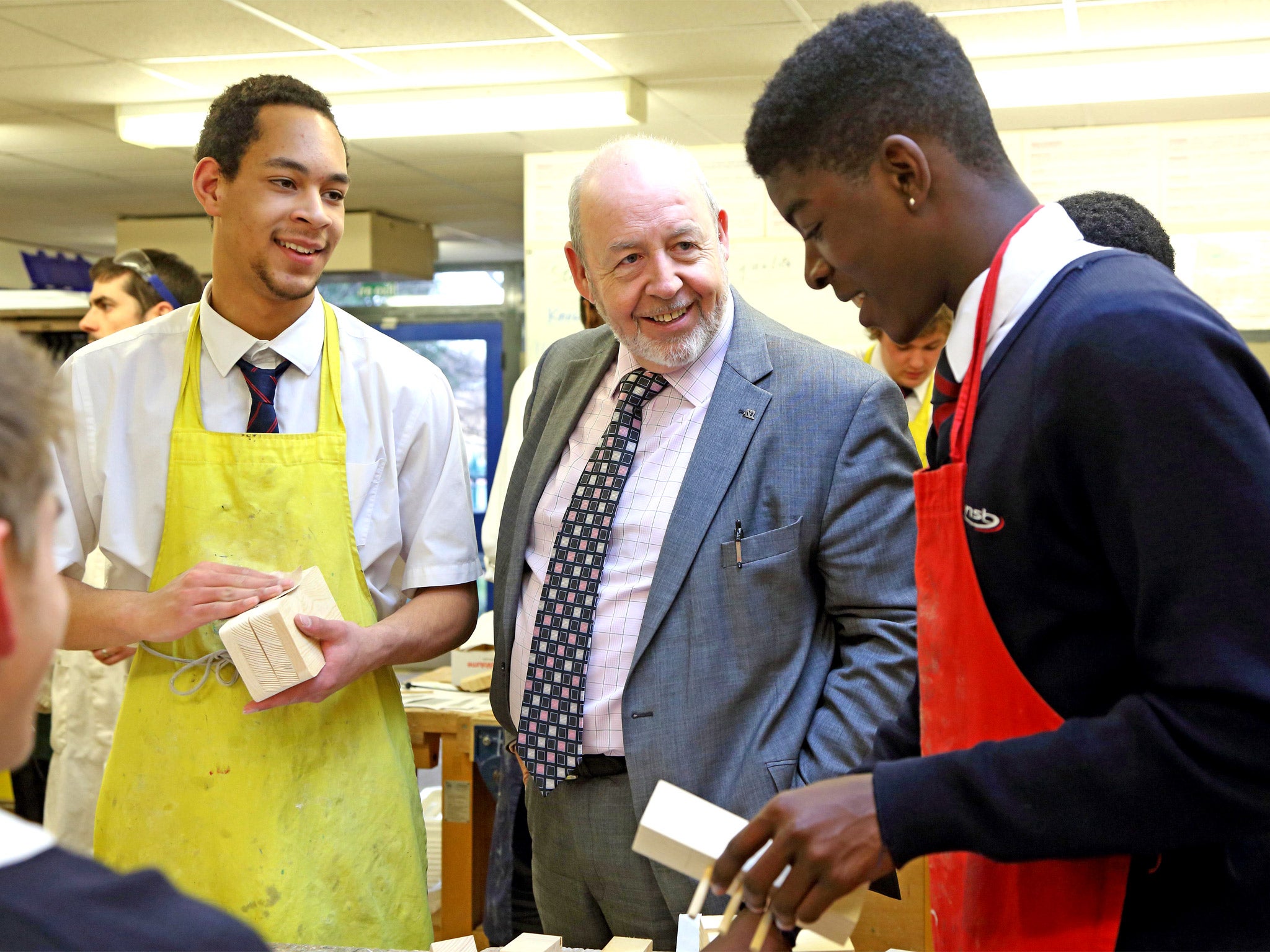 Learning curve: headteacher Mike Griffiths with pupils from Northamptom School for Boys