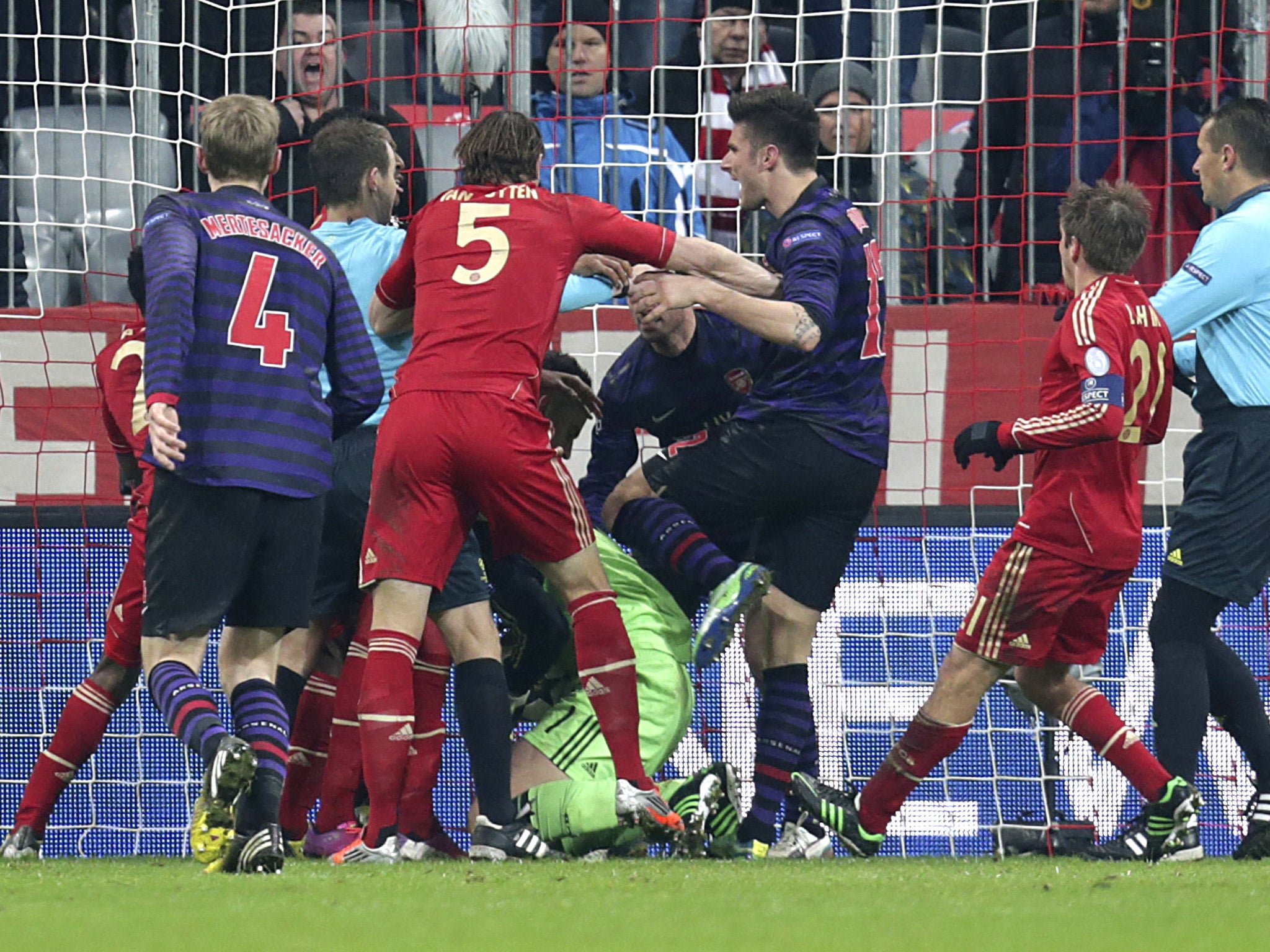 Arsenal struggle to get the ball back into play quickly after Laurent Koscielny had scored the Gunners’ second goal against Bayern