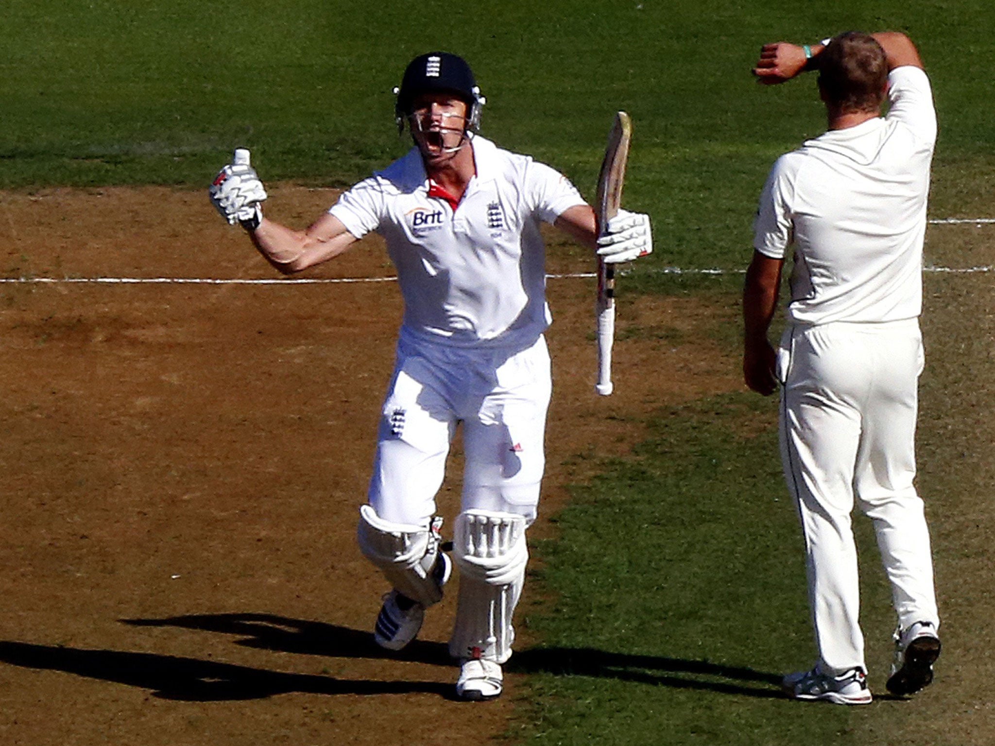 England's Nick Compton (left) celebrates reaching his century
