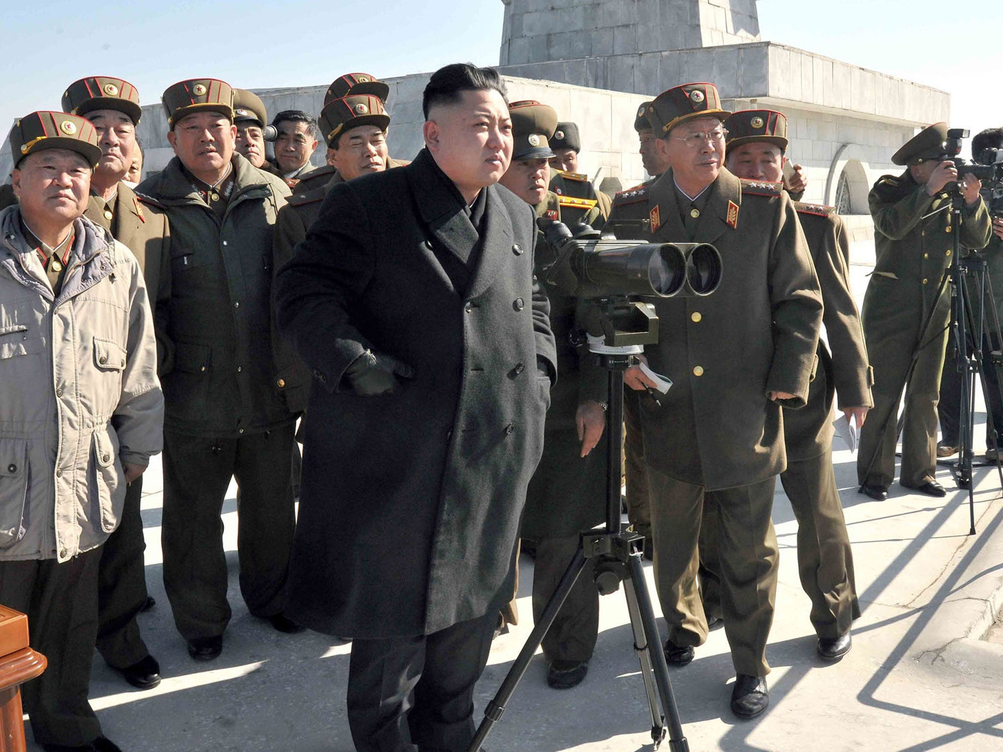 Kim Jong-un watches a live ammunition firing drill by the Jangjae Islet Defence Detachment and the Mu Islet Hero Defence Detachment