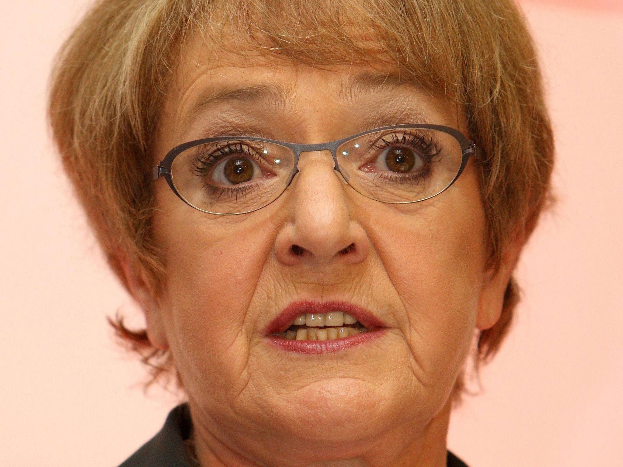 Margaret Hodge has apologised after hitting a cyclist with her car door after parking up