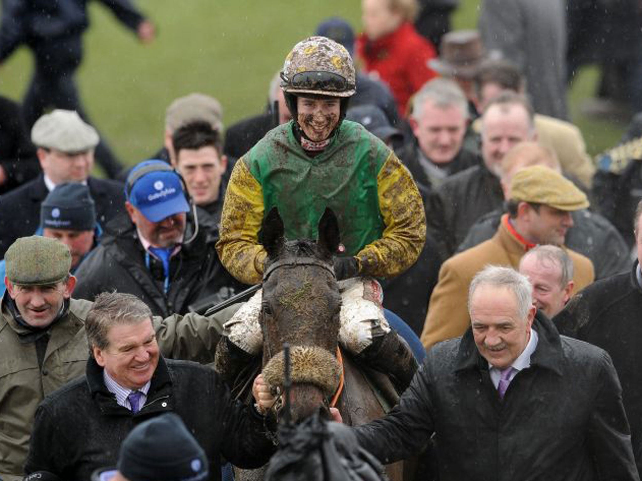 Bryan Cooper returns muddy but elated after winning on Ted Veale in the Vincent O’Brien County Handicap Hurdle yesterday