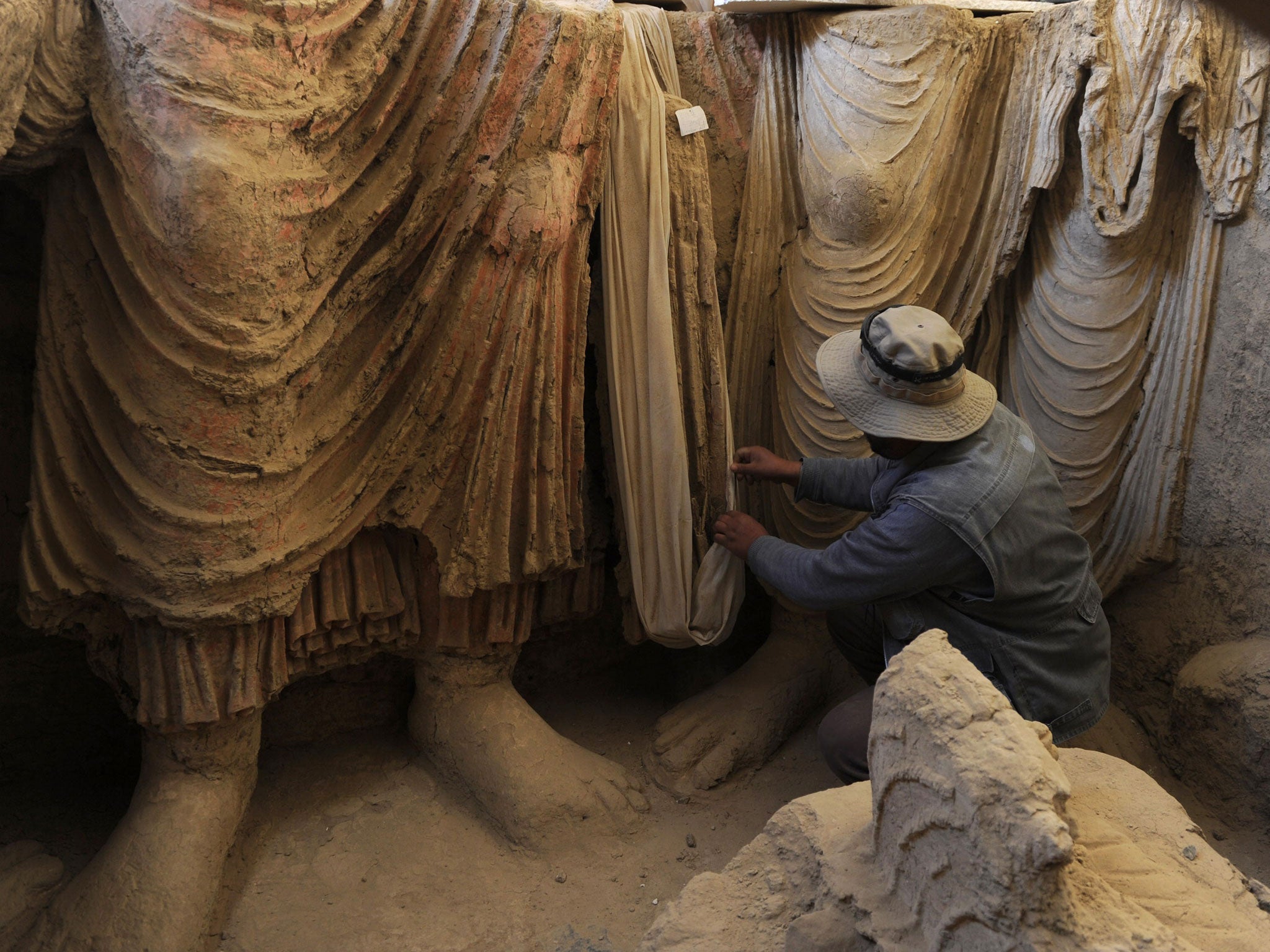 Under threat: An archaeologist studies Buddhas at Mes Aynak