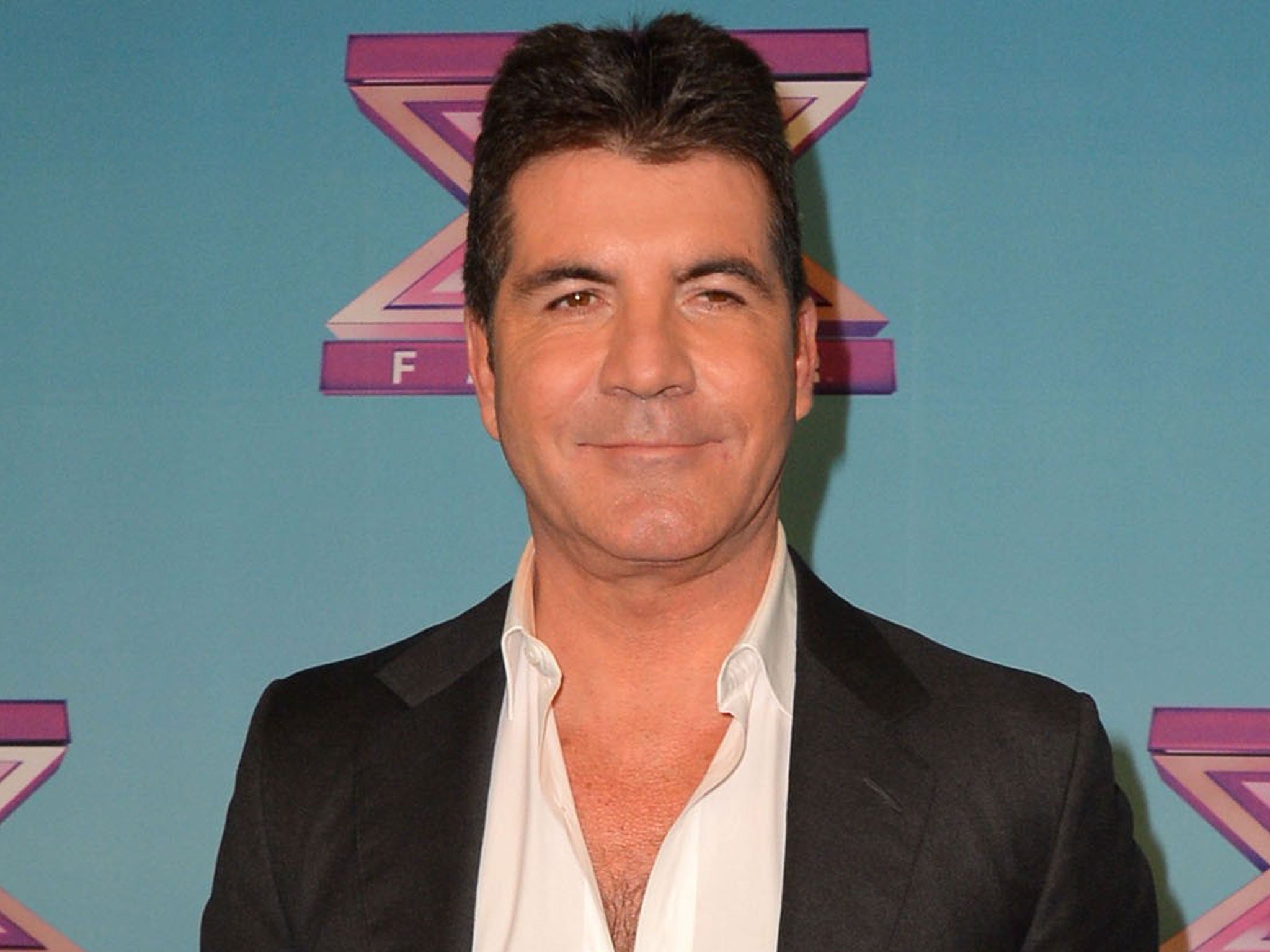 Simon Cowell is set to be a father, according to reports