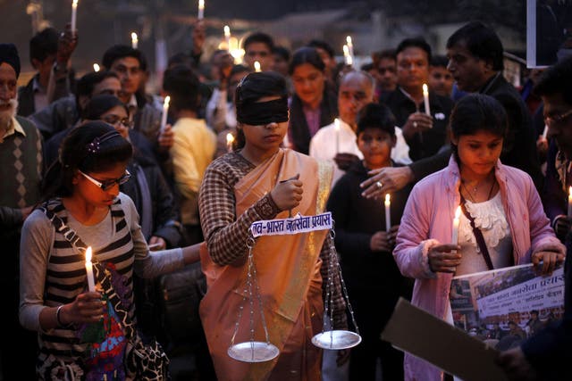 Blind justice: Candlelit vigil for the victim of the New Delhi gang rape and murder