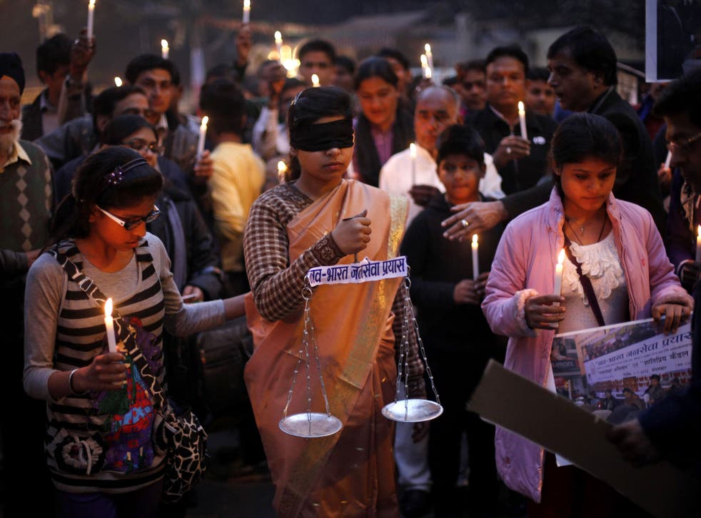Blind justice: Candlelit vigil for the victim of the New Delhi gang rape and murder